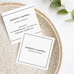 Front and back views of a classic white square business card. The front is white with a precise thin black square frame enclosing centered custom name and title details. The back simplifies the design to top and bottom border lines, with repeated name and title text at the top and contact details (phone, address, email) stacked below in a clean, professional sans-serif font.
