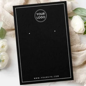 Black minimalist earring display card with white border, custom logo and customizable branding for jewelry makers.