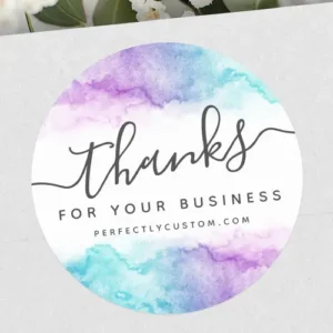 A circular business sticker with purple and turquoise watercolor splashes on the edges and a script "thanks for your business" message in the center.