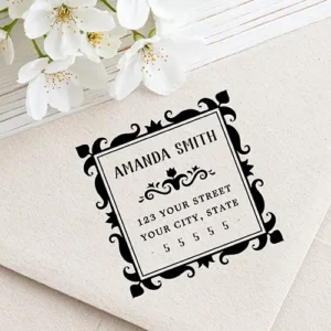 Square return address stamp design featuring an ornate tulip floral damask style border, serif name text, a floral flourish divider, and three lines of address text.