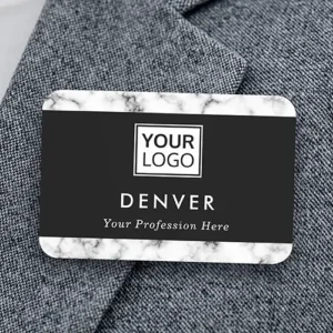 Rectangular plastic name badge with rounded corners featuring top and bottom white marble borders, a central black band with a white custom logo, a bold custom name, and an italicized job title.