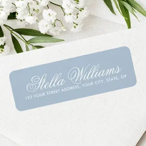 Rectangular powder blue sticker featuring elegant white cursive script for a name and white sans-serif text for the street address.