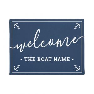 Dark blue welcome doormat with custom boat name and anchors