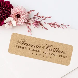 Rectangular address sticker featuring a printed tan kraft paper background with dark brown romantic script name typography and block address text.