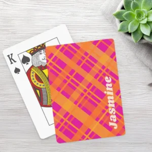 Playing cards featuring a bold, diagonal plaid tartan pattern in hot pink, orange, and magenta tones. Your custom name is printed vertically in cream-colored text along the right edge.