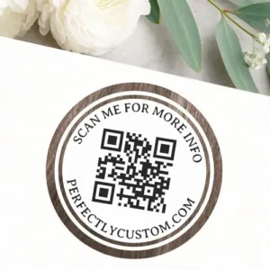 Round QR code sticker with printed brown wood grain border, white center, and editable “Scan Me for More Info” text. Perfect for small business packaging or marketing.