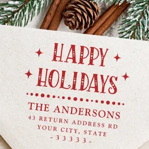 Stamp design displaying a stacked Happy Holidays headline with dot details, four-pointed starbursts, a beaded line divider, and custom multi-line serif address text.