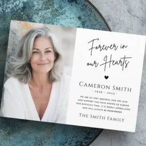Custom “Forever in Our Hearts” memorial thank-you card with photo area, elegant black script, and customizable name and message. A heartfelt funeral appreciation card to express gratitude.