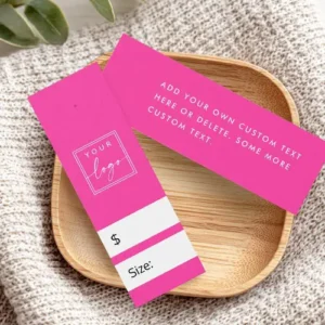 Front and back view of a bright hot pink vertical price tag. The front has space for your custom logo, followed by white fields for "$" and "Size:". The back has vertical white custom text. There is a guide dot for a hole at the top.