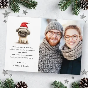 Flat holiday card displaying a white front panel with a Santa pug illustration, customizable greeting text, and a vertical custom photo.