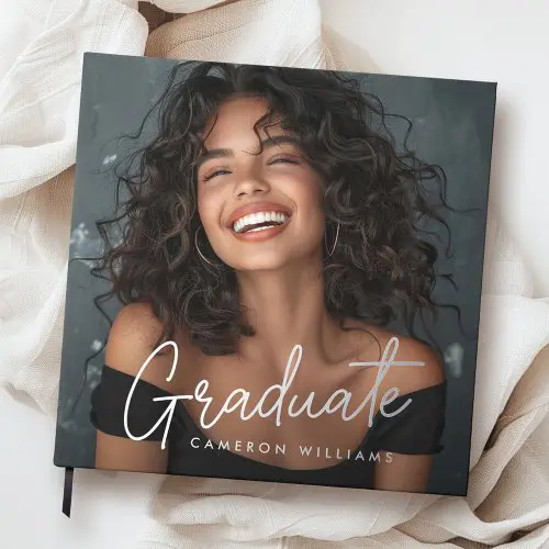 A personalized square hardcover guest book for a high school graduate with your custom, year, and school name in reflective metallic real foil. Includes a ribbon bookmark.