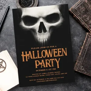 Dark Halloween card featuring a textured white and grey skull face on a black background, paired with orange event typography for date, location, and RSVP details.