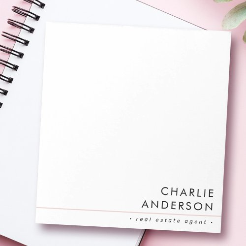 Minimalist custom business notepad with white background, personalized name and job title in lower right corner, and subtle blush pink accent line. Professional stationery for real estate agents, consultants, and business use.