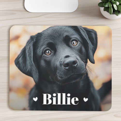Personalized mousepad featuring full photo background, white serif text, and heart accents. Customizable design for pet lovers and gift giving.