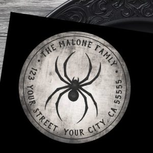 Round personalized return address label with a black spider, distressed gray gothic background, and custom return address.