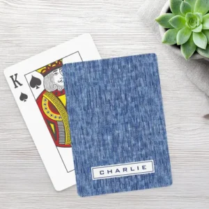 Personalized playing card with blue denim fabric pattern background and a white nameplate featuring your custom name in bold navy text.