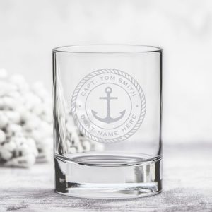 Custom etched rock glass with nautical anchor and rope design, featuring personalized captain’s name and boat name. Ideal whiskey or cocktail glass with maritime style.