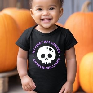 Black baby bodysuit with white skull and purple “My First Halloween” personalized design.