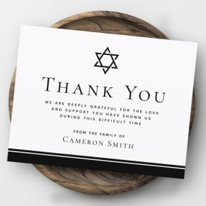 Elegant black and white sympathy thank-you card for funerals and memorial services.
