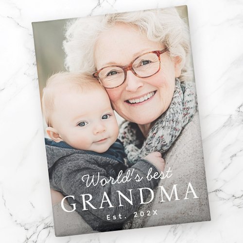 Custom fridge magnet with family photo and “World’s best Grandma” text in white lettering, includes customizable year.