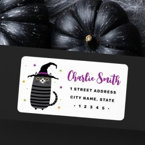 Halloween return address label with a striped black cat wearing a witch hat, surrounded by colorful star accents, next to space for a personalized name and address.