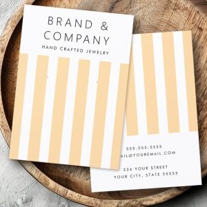 Custom light yellow and white striped earring display card with space for shop name and contact details.
