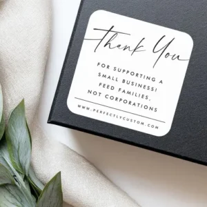 Minimalist black and white small business thank you sticker with elegant script text, modern sans-serif lettering, and rounded corners on a white background.