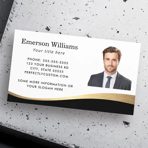 A two-sided business card. The front is white with a custom photo and contact text above a black and printed gold-tone wave. The back is solid black with a central logo placeholder.