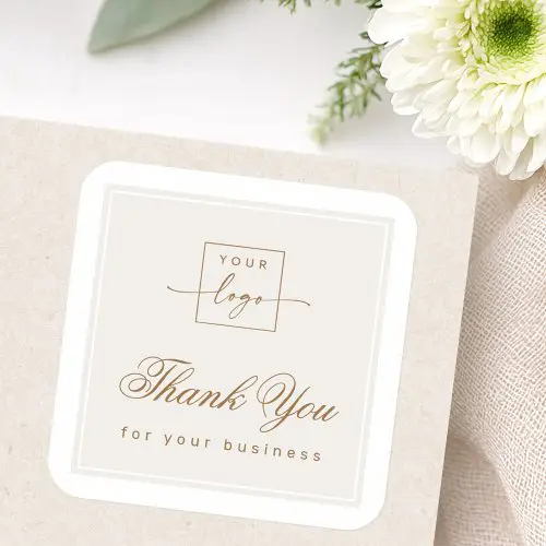 A square paper sticker with rounded corners, featuring a cream background and dark bronze text. Your custom logo is placed at the top. Below, "Thank You" is in an elegant, flowing script, followed by "for your business" in a modern sans-serif. A double-line border frames the central design.