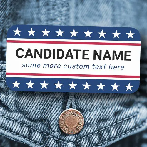 A rectangle plastic supporter badge measuring 3x1.5 inches. Design features white stars on blue borders at top and bottom, red horizontal lines, and a white center with bold black custom name text and blue italicized subtext.