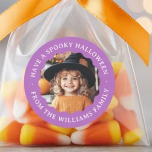 Round purple sticker featuring a central custom photo with a scalloped frame and personalized text arches for a name and message.