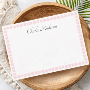 Note featuring a repeating border pattern of interlocking geometric abstract mosaic blocks in rose pink. Centered at the top, a custom name is displayed in an elegant charcoal grey calligraphic script font. The design is clean, elegant, and modern.