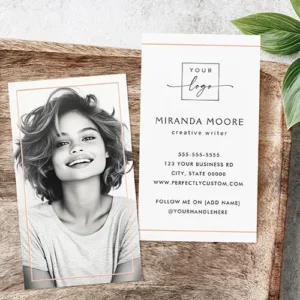 Full photo real foil borders frame trendy business cards A portrait-oriented business card. The front view features a large vertical frame for a custom portrait photograph, outlined in thin rose gold foil. The back view shows a minimalist white card layout with horizontal rose gold lines near the edges, framing a centered stack of text fields for a company logo, name, title, phone, address, and website URL.