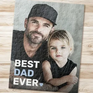 Best dad ever photo heart fathers day jigsaw puzzle Vertical jigsaw puzzle featuring a custom photo portrait with bold stacked Best Dad Ever typography and a small heart icon in the lower corner.