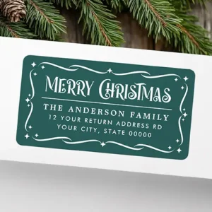 Vintage forest green Merry Christmas return address label. Horizontal forest green self-adhesive address label featuring ornate white filigree scrollwork framing white Art Nouveau Merry Christmas text and custom address lines.