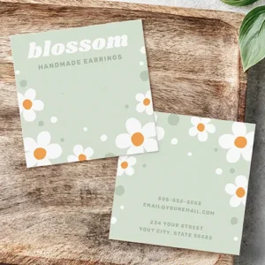 Strawberry blossom retro light green earring card Two-sided square earring packaging card showing white daisy illustrations on a sage green background with custom business headline text and reverse contact info lines.