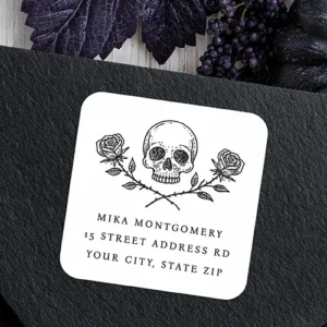 Gothic Skull & Roses Halloween Return Address Square Sticker Gothic return address sticker with a detailed skull and rose artwork centered above customizable name and address details in black serif font.