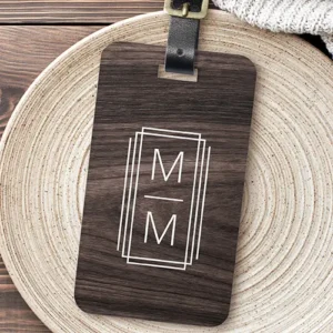 Stylish monogram initials elegant wood grain luggage tag A rectangular dark espresso wood grain luggage tag with rounded corners, featuring a white triple geometric frame enclosing stacked custom initials, attached with a leather strap.