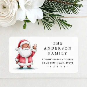 Christmas return address sticker displaying a cheerful Black Santa in a red suit on a white backdrop beside neat typography lines for name, street address, and zip code.